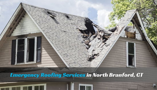 Close-up of a damaged roof in North Branford, CT, showing missing shingles and exposed underlayment.