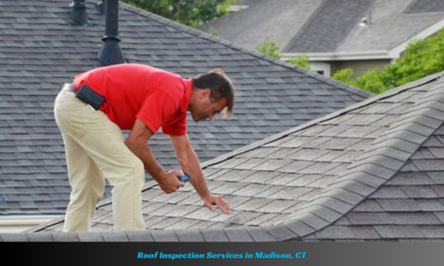 Roof inspector examining a roof in Madison, CT. The image shows the inspector on a ladder, inspecting the roof for damage or wear, with tools and equipment nearby.